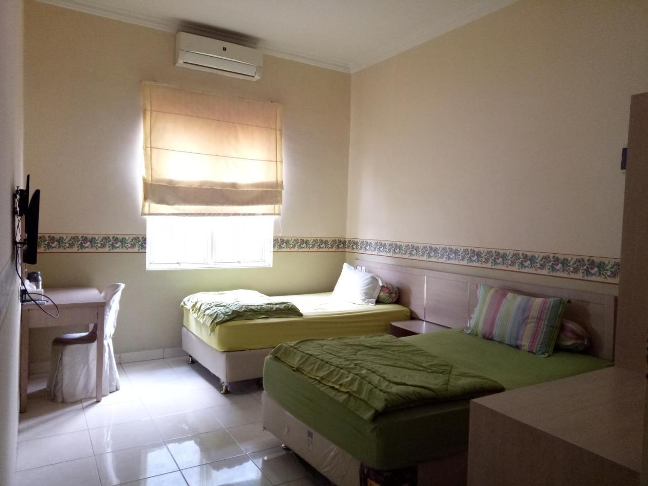 Hotel Roemah Moesi à Medan Extérieur photo